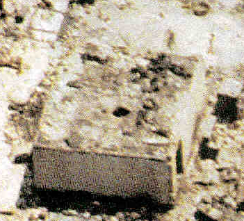 Closeup of the hole in the top of the concrete room
